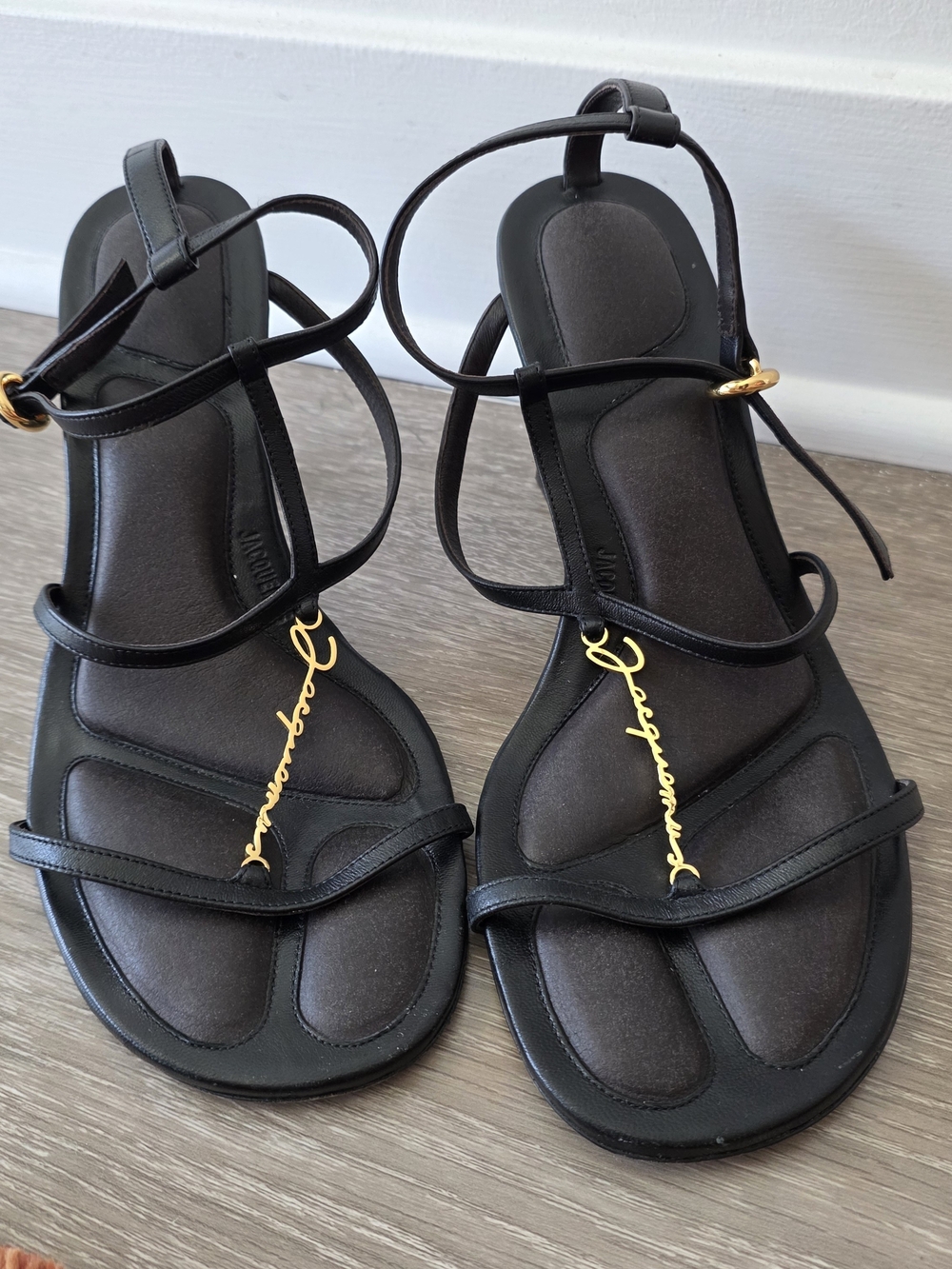 Jacquemus Black Strappy Sandals with Gold Signature